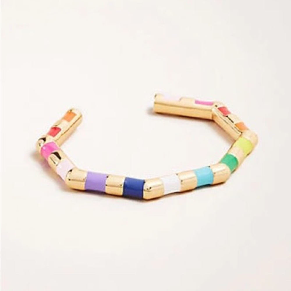 Stackable rainbow rings and matching bracelets. No damage. Like new.